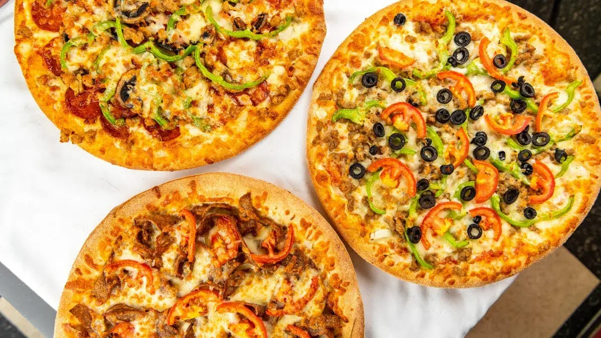 Hawaiian pizza with gooey cheese at Pizza 3000 Montgomery Calgary